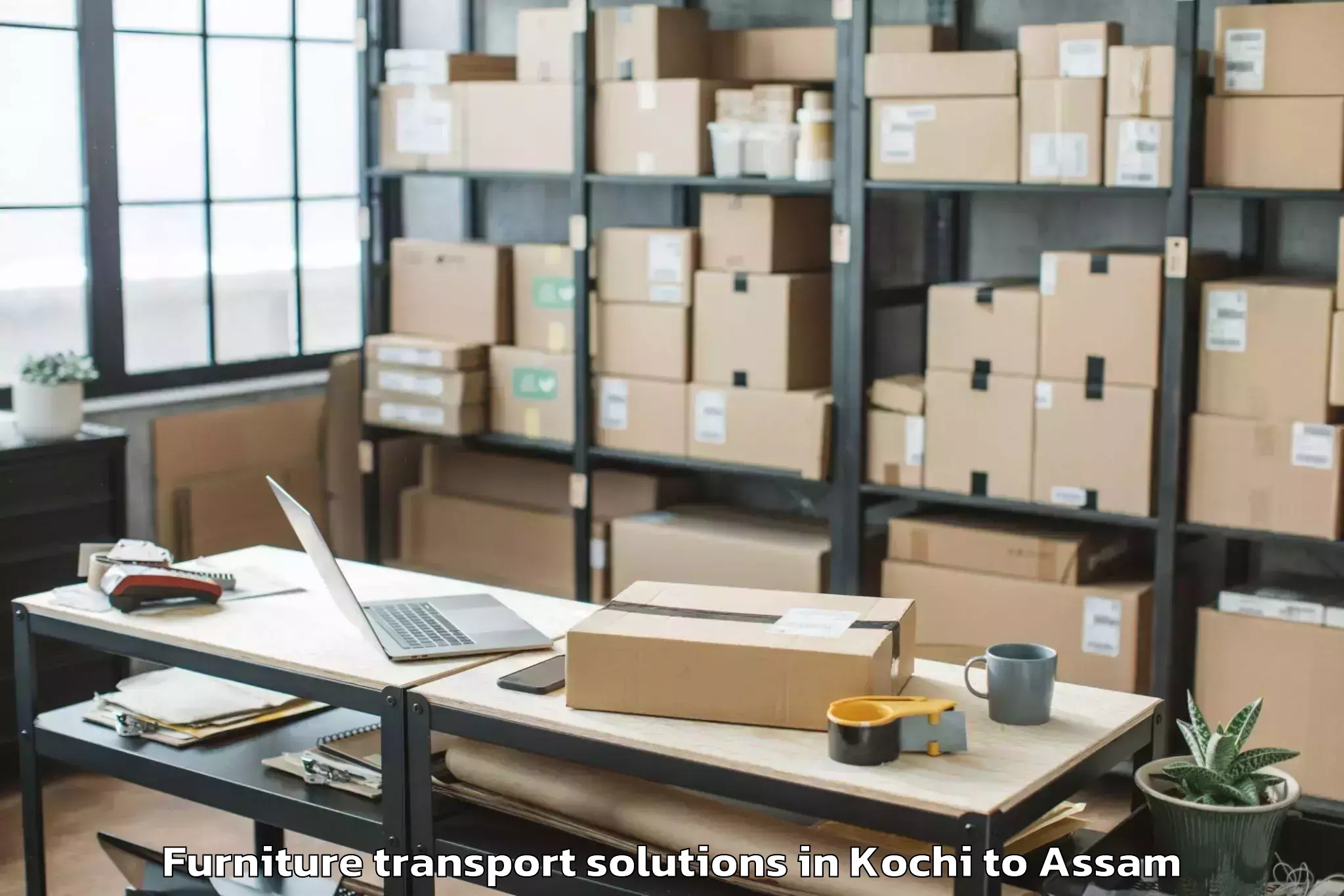 Book Kochi to Bhergaon Furniture Transport Solutions Online